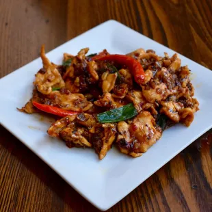 Pickled Sichuan Chicken - pickled chili peppers, minced pork &amp; scallions meet chicken in this flavorful dish.