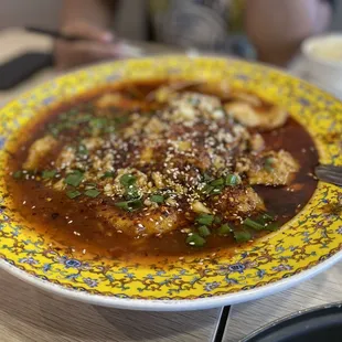 a bowl of soup on a table