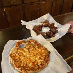 Buffalo chicken pizza (couldn't wait lol) Jamaican jerk wings