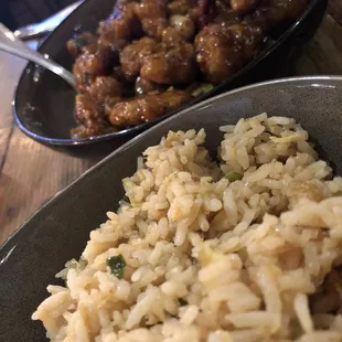 a plate of rice and meat