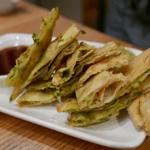 Complementary green scallion pancake was yummy