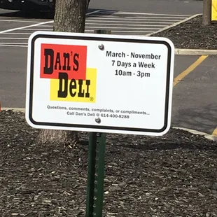 a sign in a parking lot