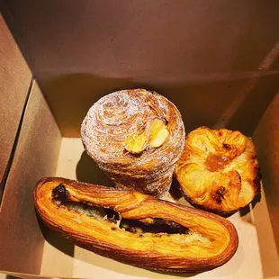 a variety of pastries in a box