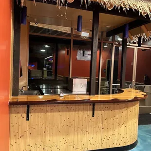 a view of a restaurant counter