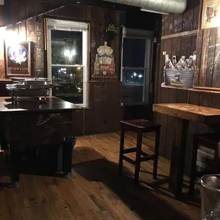 a view of the bar and dining area