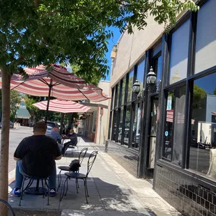 3 tables on sidewalk and no tables inside