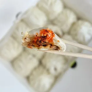 猪肉大葱小包 Pork &amp; green onion baozi dipped in their house chili sauce | 12 pc - $14 (CC's accepted w/ $30 min)