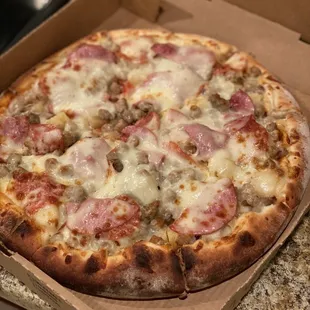All meat + pineapple pizza
