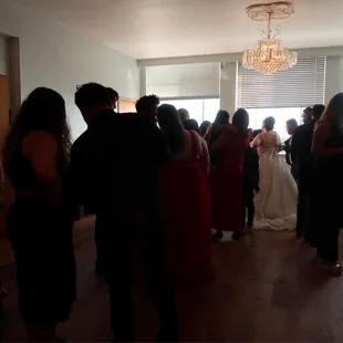 a group of people standing in a room