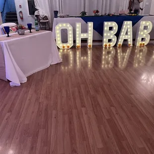 a photo of a baby sign