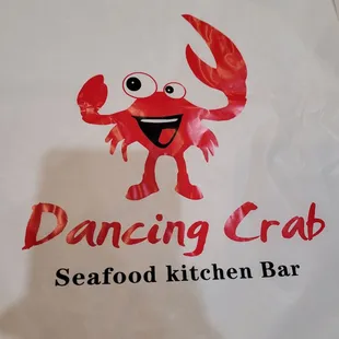 The Dancing Crab logo on a bib