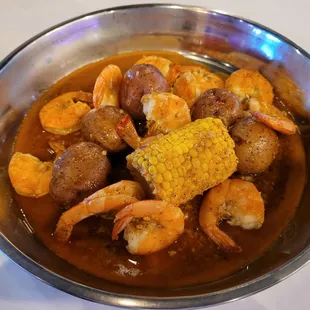 1/2lb of shrimp, extra potatoes, and corn in garlic butter sauce