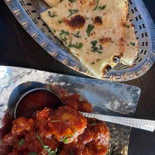 Gobi Manchurian side of garlic naan.