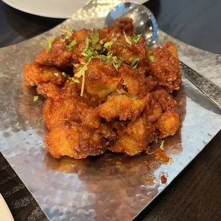a plate of fried food