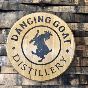 a wooden sign on a wall