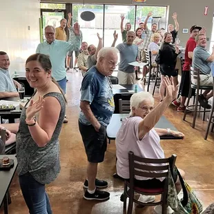 a group of people in a restaurant