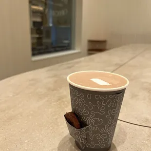 Mocha with a pocket cookie and marshmallow