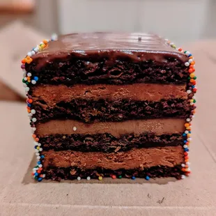 Celebration Cake. Devil's food cake, caramel mousse, cacao husk jam and covered with a smooth 70% Camino Verde ganache