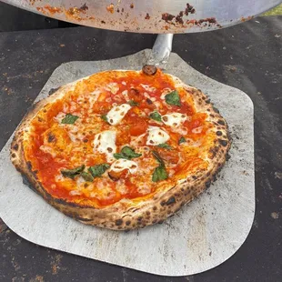 a pizza being prepared