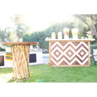 Mickayla bar with one of her three amigo cocktail tables