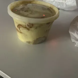 a yogurt in a plastic container