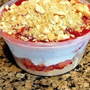 a dessert in a plastic container