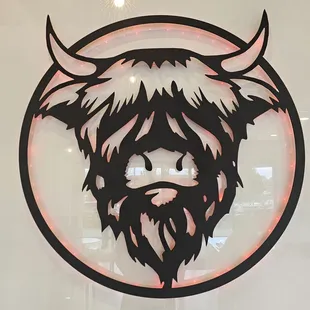 a highland cow with a beard