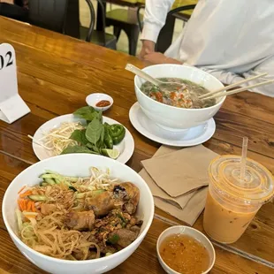bun thit nuong dac biet and pho tai. with 16 oz. Dangki Thai Tea