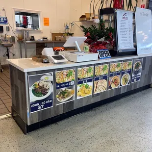 a counter with a variety of food items
