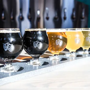 a row of beer glasses