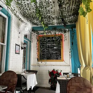 a restaurant with tables and chairs