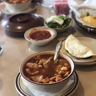 a bowl of soup with a spoon in it
