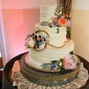 A subtle nod to this couple's Disney obsession was perfect on their homemade FUNFETTI wedding cake!