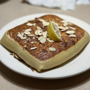 a slice of lemon on a plate