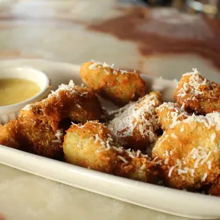 a plate of fried tots