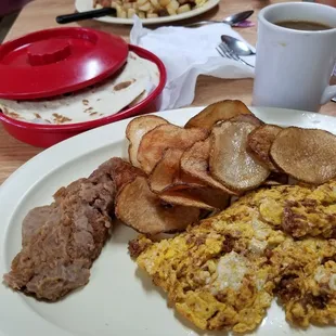 Chorizo n egg. Them re-refried beans tho.