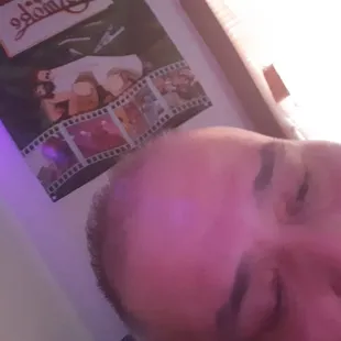 a man holding a cell phone to his ear