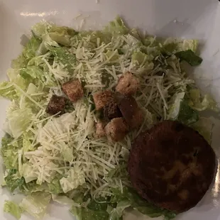 Caesar salad with crab cake.