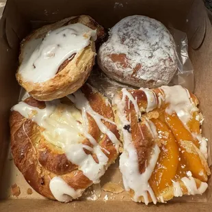 Cheese danish, peach danish, powdered jelly n some French pastry. I ate the powdered cream donut already.