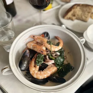 The shellfish waterzooi would be great with a dry bubbly or white wine.