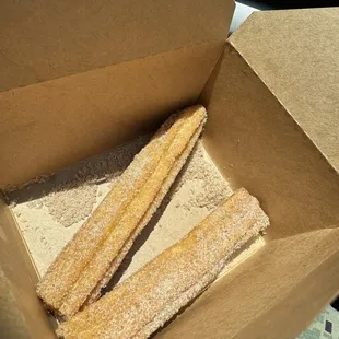 Churro stuffed with caramel sauce