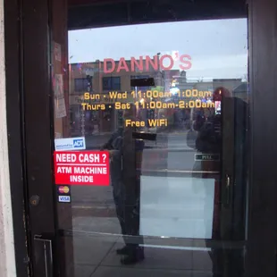 Hours of operation, front entry door.