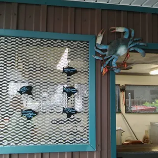 a blue crab on the wall