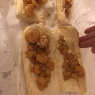 They say they are home of overstuffed po-boys but these are shrunken shrimp and looks skimpy no matter if it is plain.