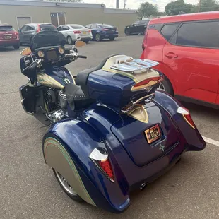 Added gold leaf &amp; turquoise pin strip to touring trunk and turquoise Zia to lower trunk li