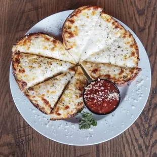 a pizza with cheese and sauce