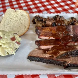 Ribs + burnt ends combo meal with potato salad.