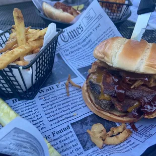 Haskell&apos;s burger (bacon, cheese, onion straws, bbq sauce) and chive fries