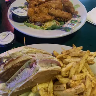 Buffalo chicken salad and Cuban with seasoned fries