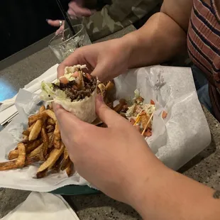 a person eating a sandwich